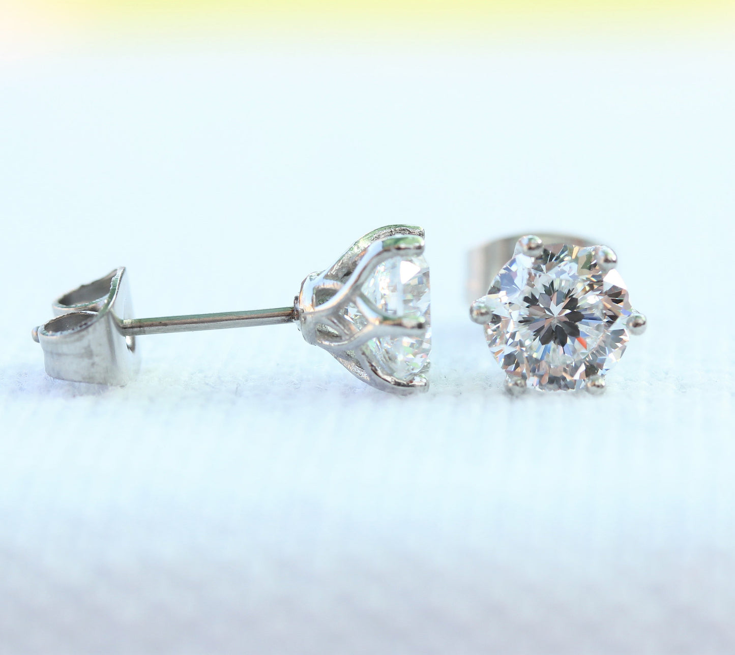 Flower and Hearts Cut Man Made Diamond Simulant stud earrings, available in titanium, white gold and surgical steel 4mm, 5mm or 6mm sizes