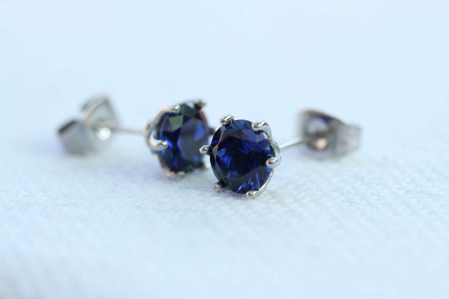 Natural Blue Sapphire stud earrings, available in titanium, white gold and surgical steel 4mm, 5mm and 6mm sizes