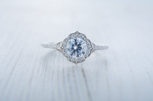 Man made diamond halo solitaire engagement ring available in Sterling Silver or White Gold Filled