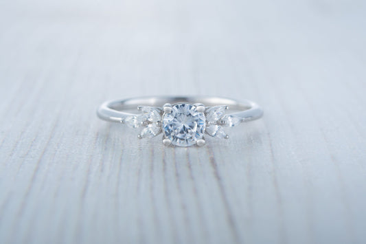 Man made diamond round & marquise solitaire engagement ring available in Sterling Silver or White Gold Filled