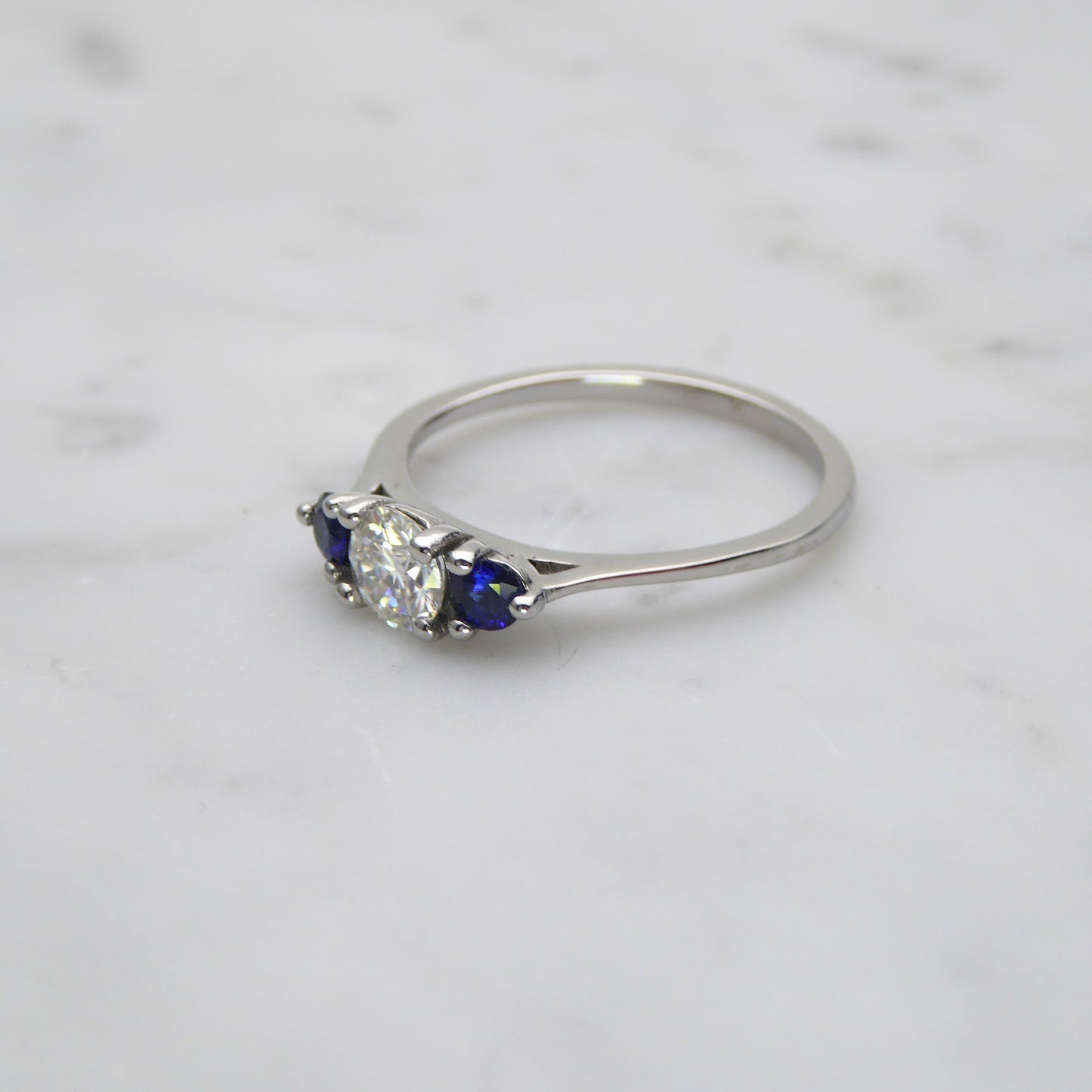 Moissanite & Natural Blue Sapphire 3 stone Trilogy Ring in White Gold or Titanium - engagement ring - handmade ring