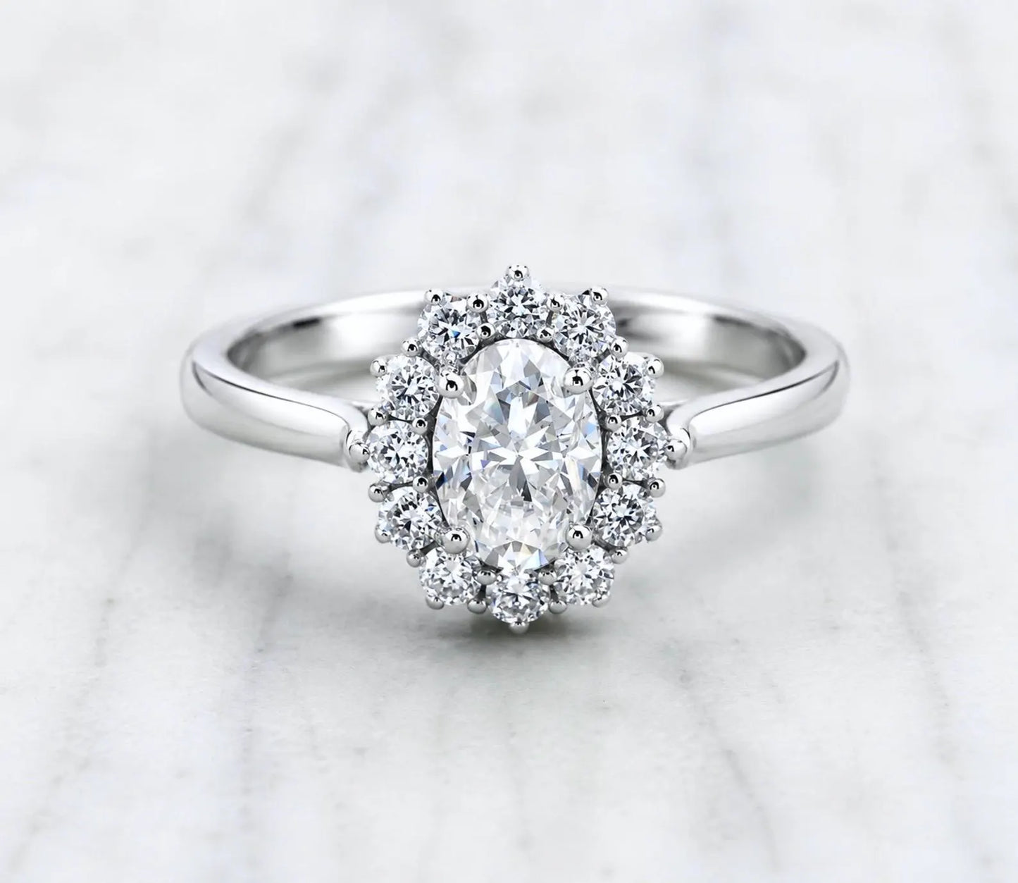 Oval cut, Halo Moissnaite engagement ring available in titanium or white gold filled