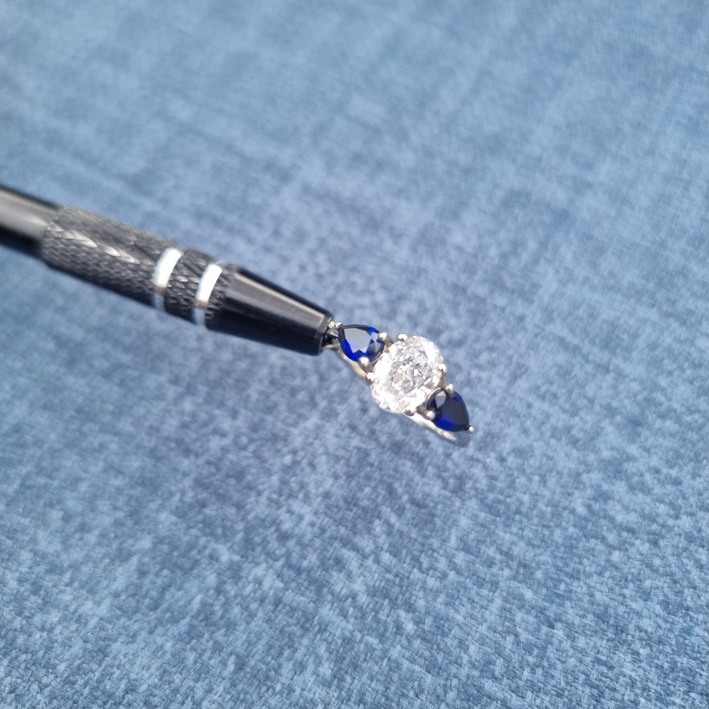 Lab blue sapphire and White Genuine moissanite Oval & pear cut 3 stone Trilogy Ring in White Gold or Titanium