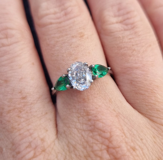 Lab Emerald and White Genuine moissanite Oval & pear cut 3 stone Trilogy Ring in White Gold or Titanium