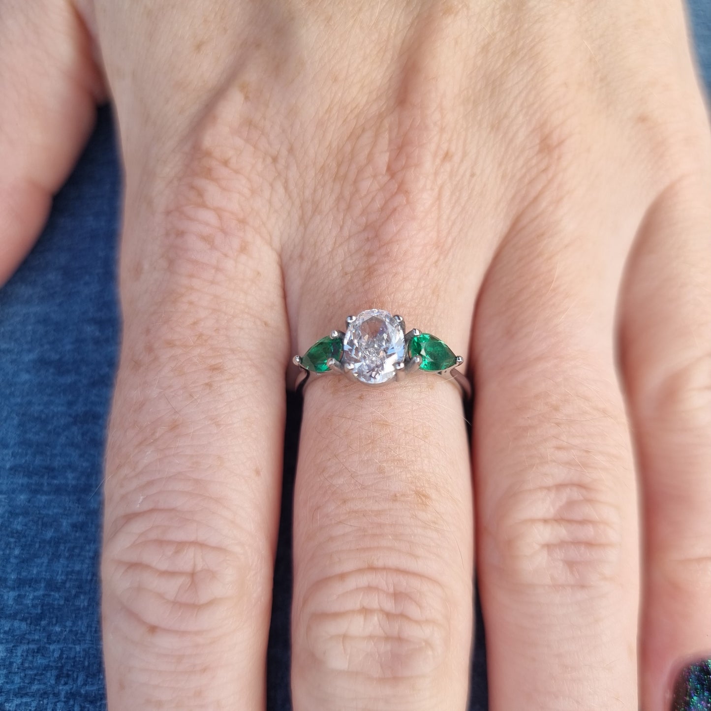 Lab Emerald and White Genuine moissanite Oval & pear cut 3 stone Trilogy Ring in White Gold or Titanium