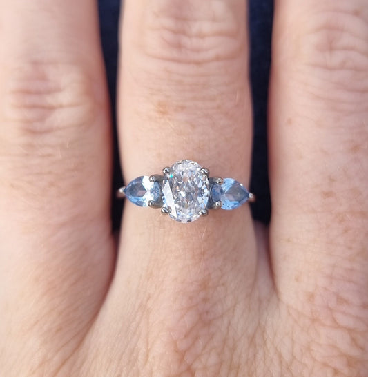 Aquamarine and White Genuine moissanite Oval & pear cut 3 stone Trilogy Ring in White Gold or Titanium