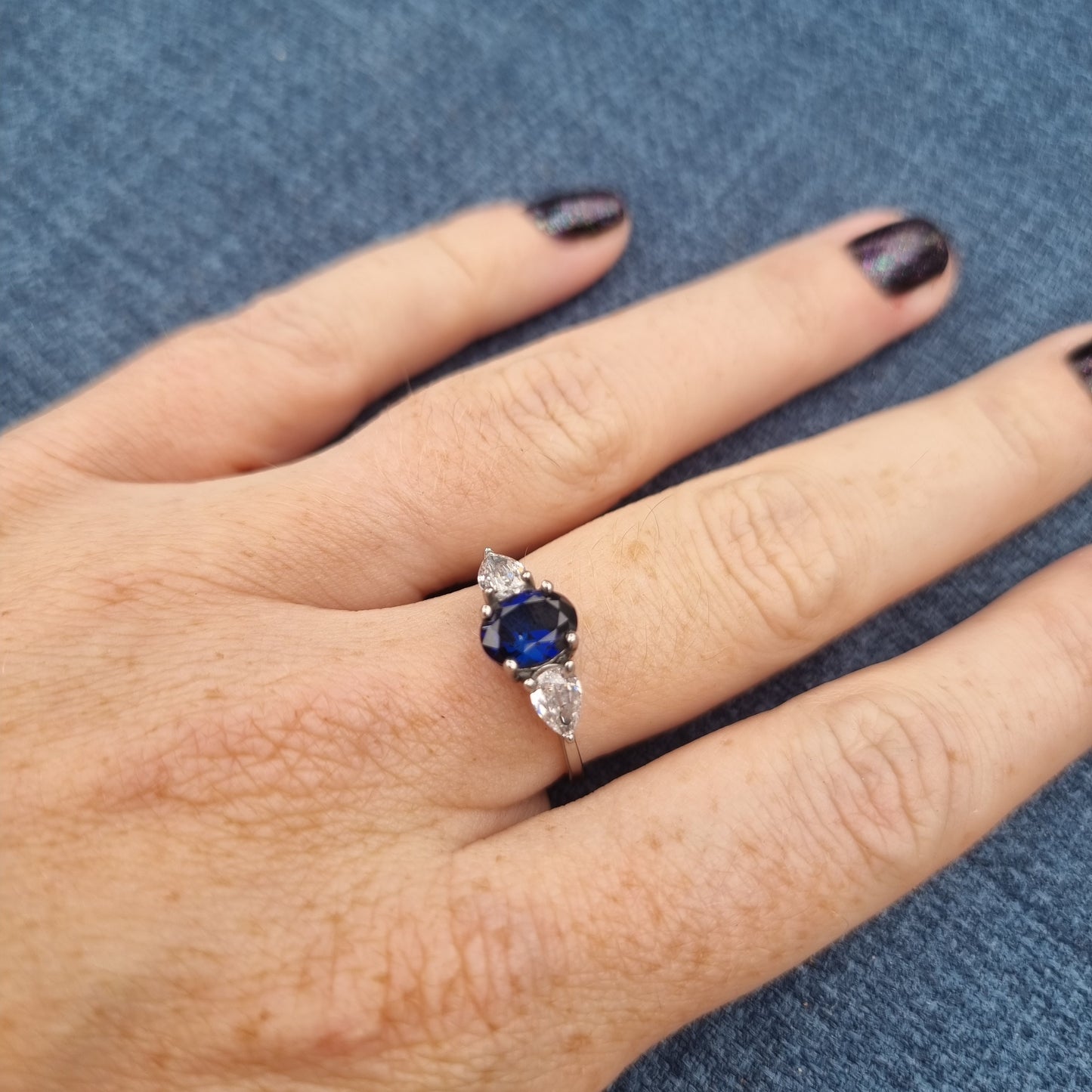 Blue Sapphire and White Genuine moissanite Oval & pear cut 3 stone Trilogy Ring in White Gold or Titanium  - engagement ring - handmade ring