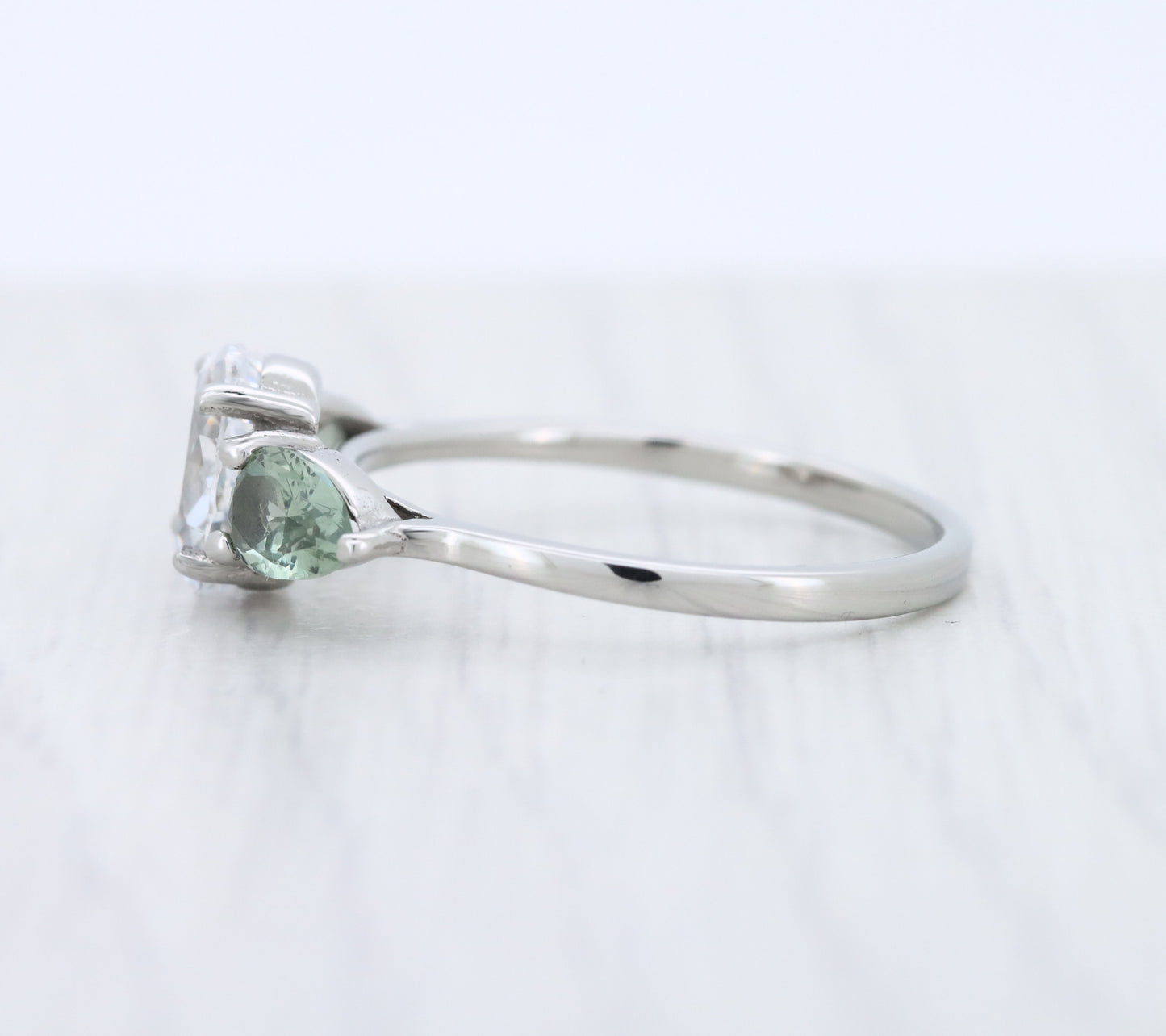 Green Sapphire and White Genuine moissanite Oval & pear cut 3 stone Trilogy Ring in White Gold or Titanium