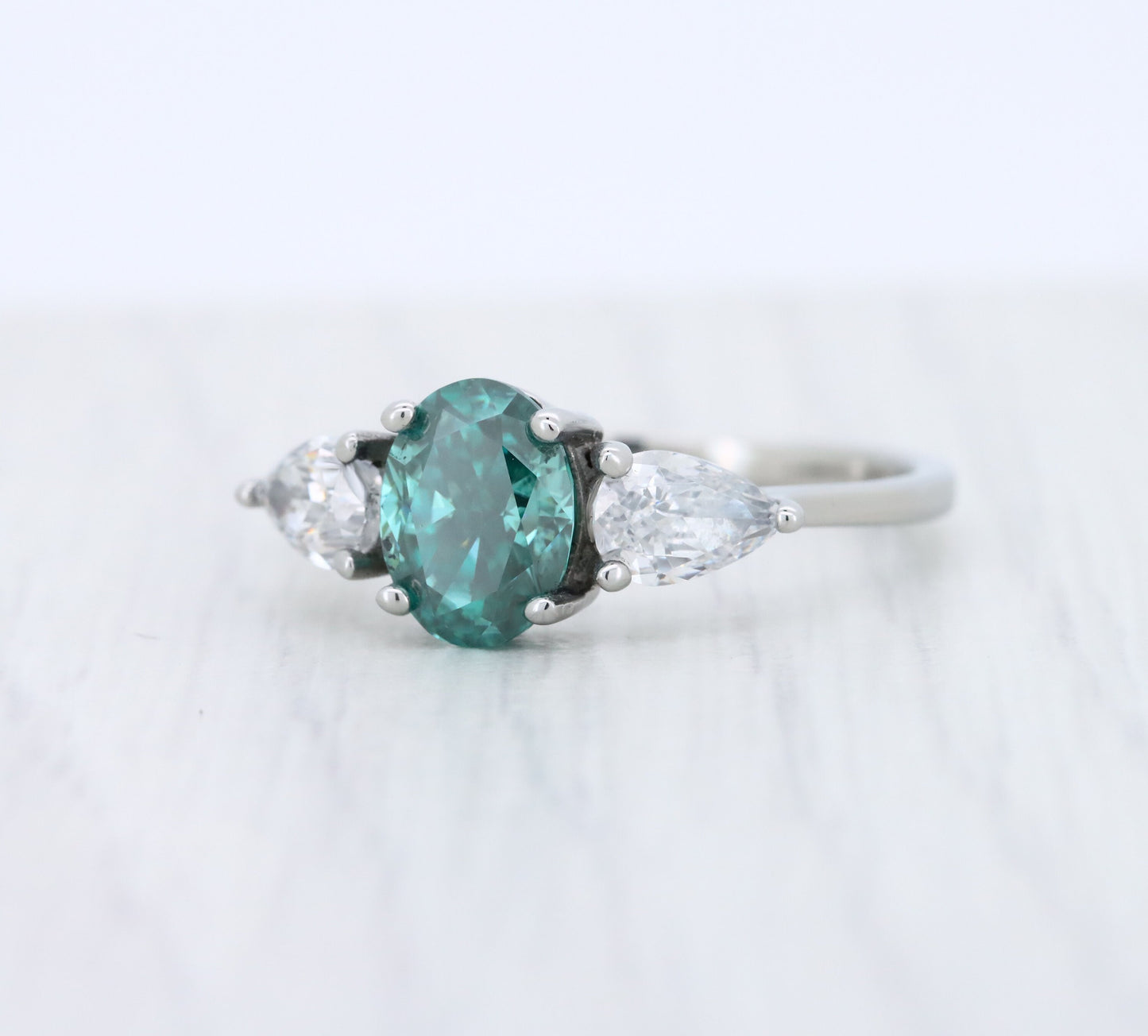 Teal and White Genuine moissanite Oval & pear cut 3 stone Trilogy Ring in White Gold or Titanium  - engagement ring - handmade ring