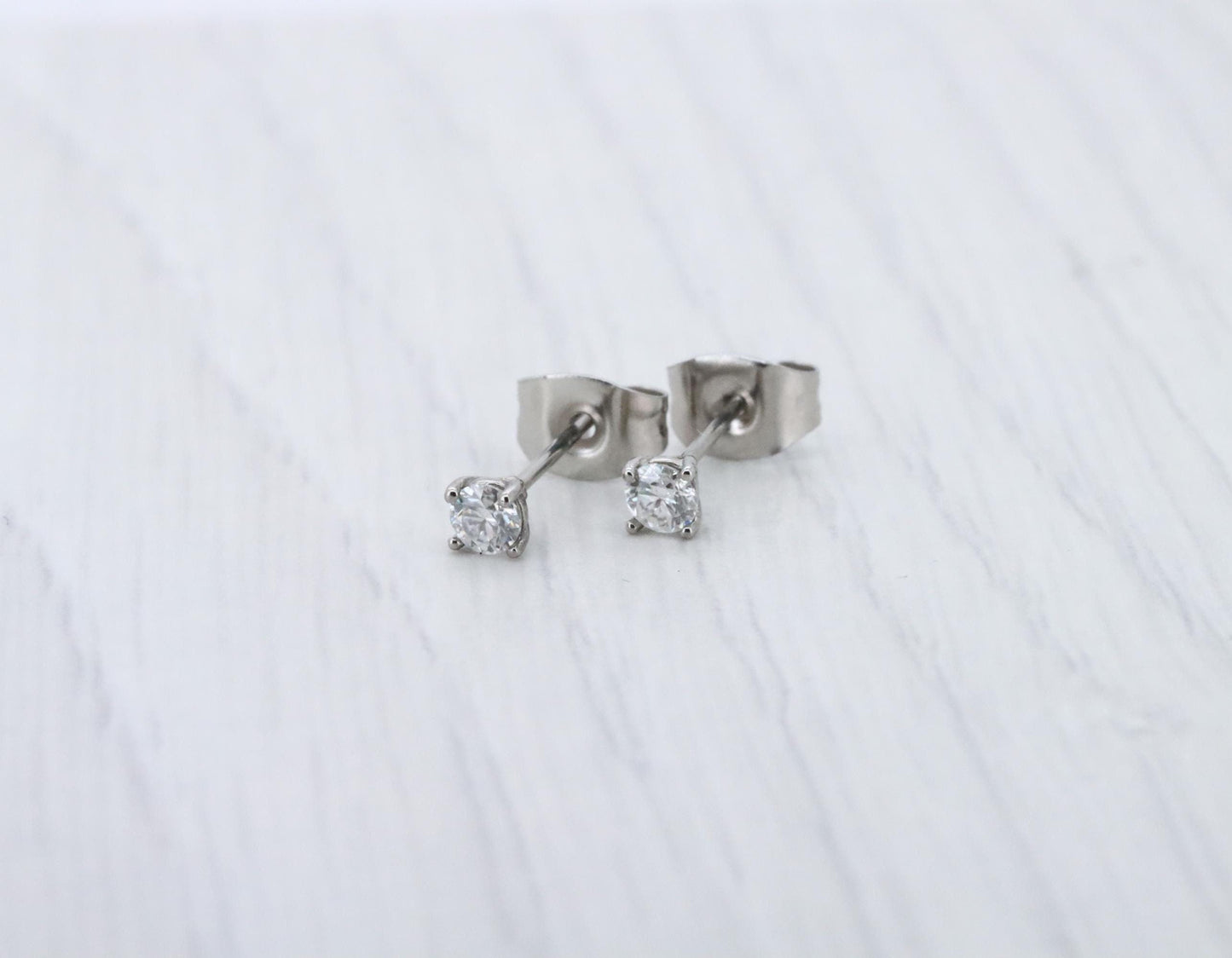 GENUINE Moissanite 3mm stud earrings, available in pure titanium, white gold and surgical steel