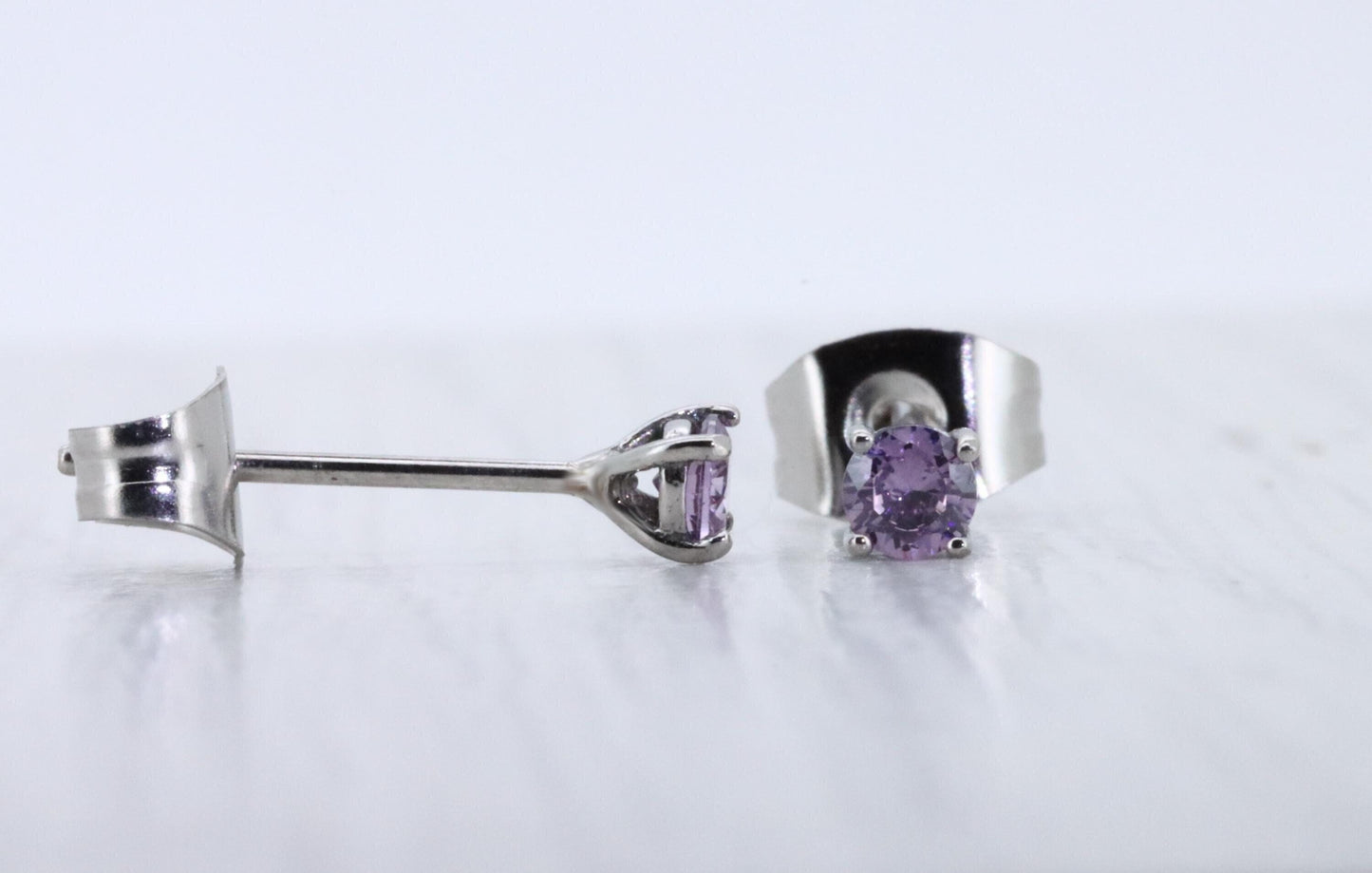 3mm Natural Amethyst stud earrings, available in titanium, white gold and surgical steel