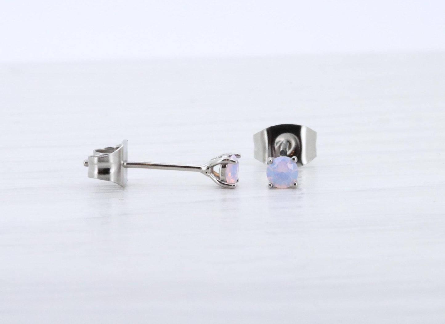 3mm Opal stud earrings, available in titanium, white gold and surgical steel