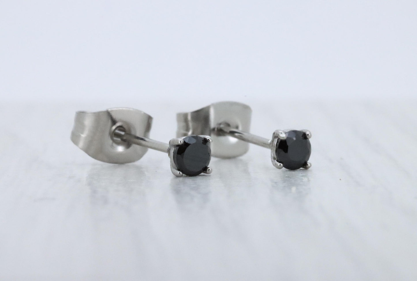 3mm Natural Onyx stud earrings, available in titanium, white gold and surgical steel