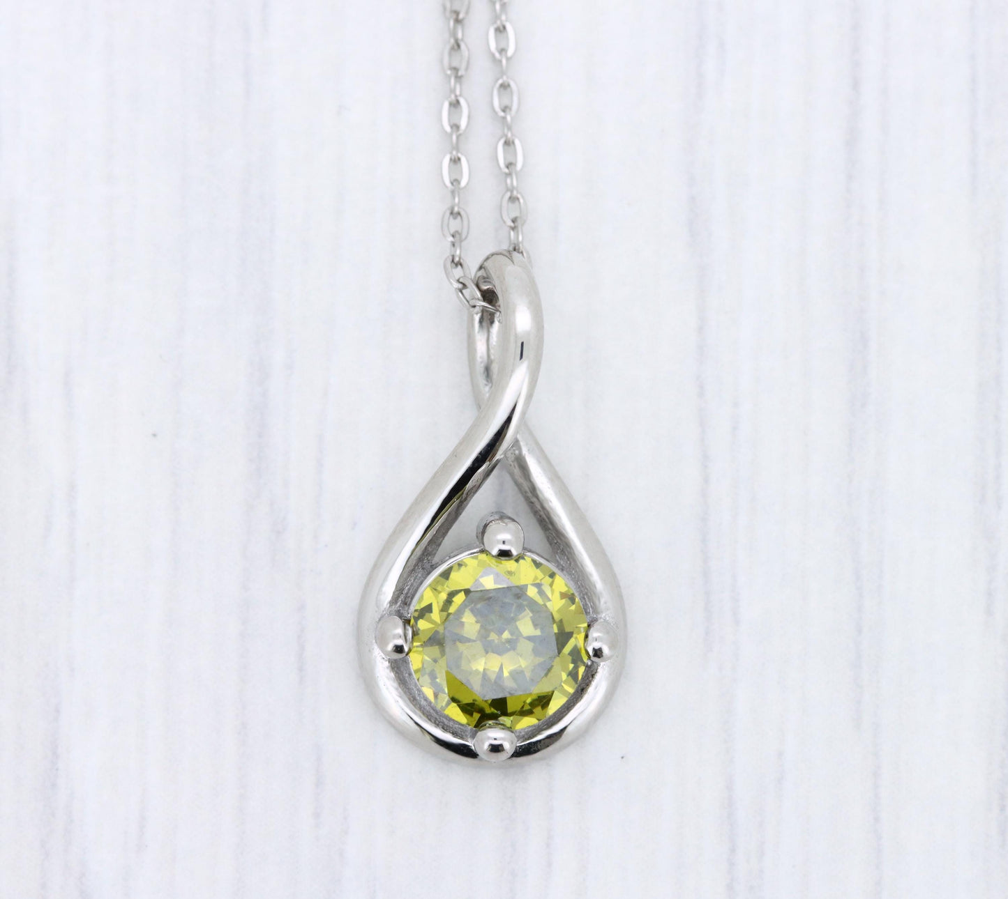 Twist style Necklace pendant with 6mm natural Peridot - titanium