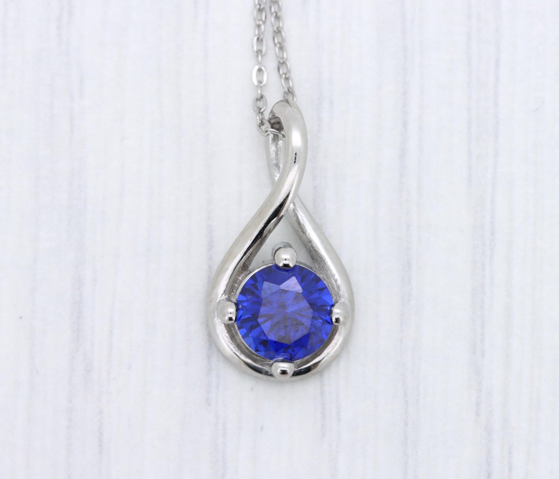 Twist style Necklace pendant with 6mm Lab Blue Sapphire - titanium