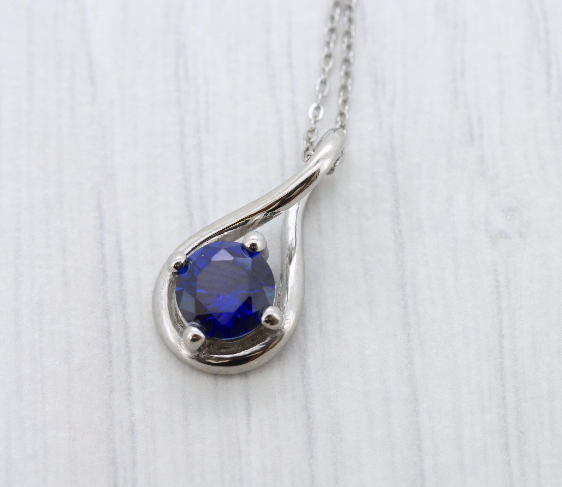 Twist style Necklace pendant with 6mm Lab Blue Sapphire - titanium
