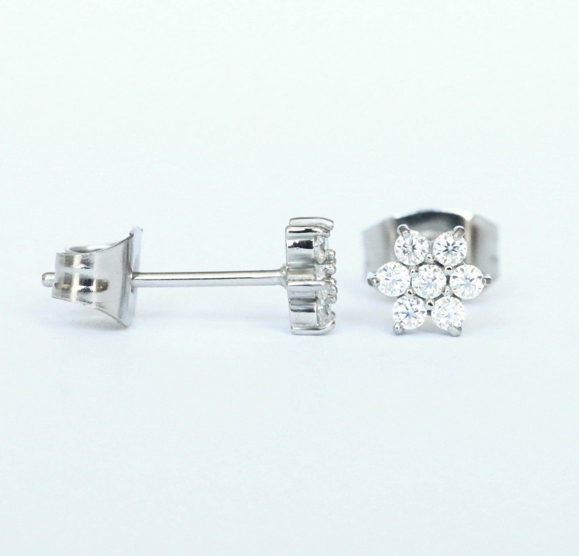 GENUINE Moissanite flower stud earrings, available in titanium, white gold and surgical steel