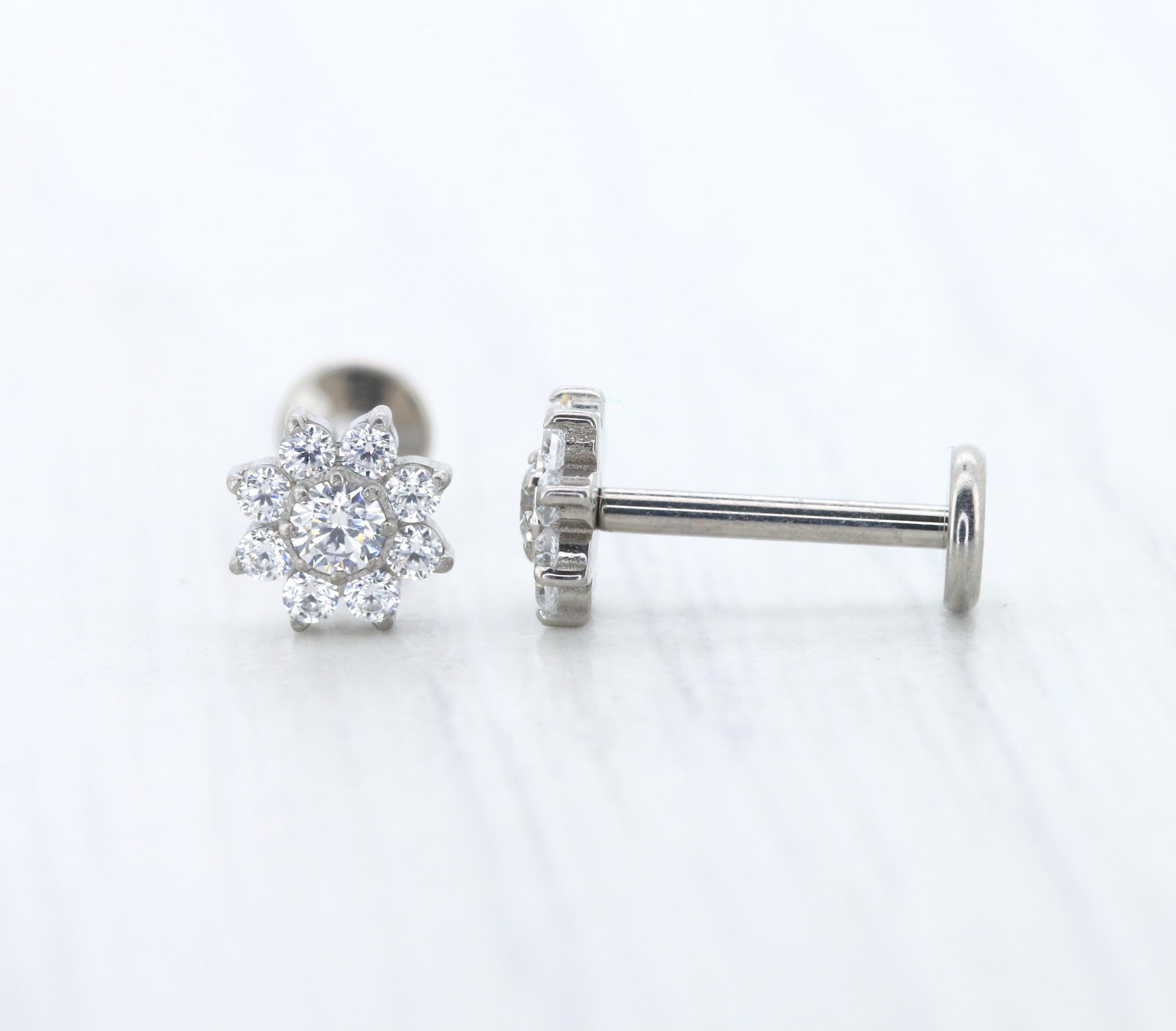 Pure titanium screw back stud earrings with marquise simulated diamonds - flower / star design