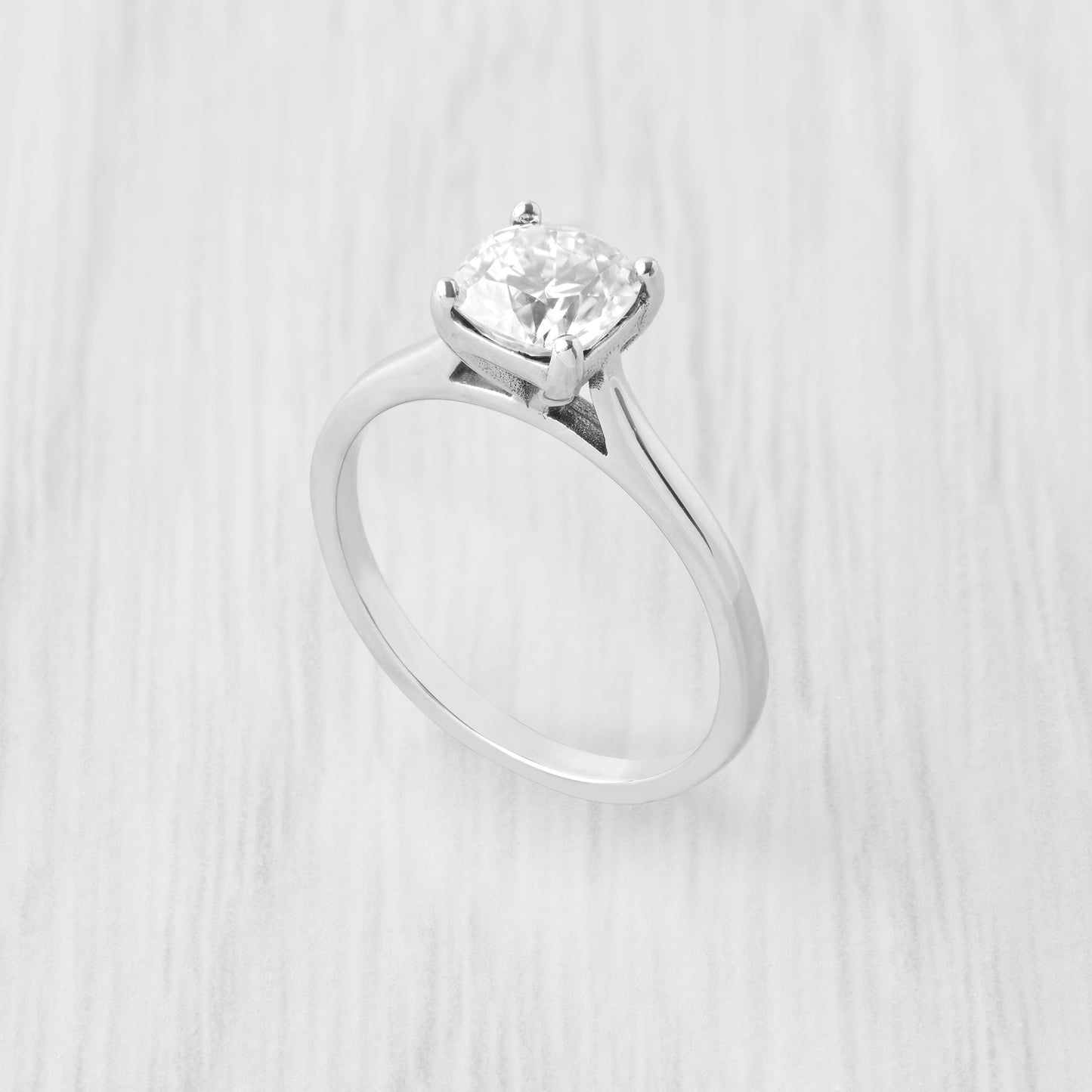 Cushion cut Moissanite Solitaire cathedral ring in Titanium or White Gold