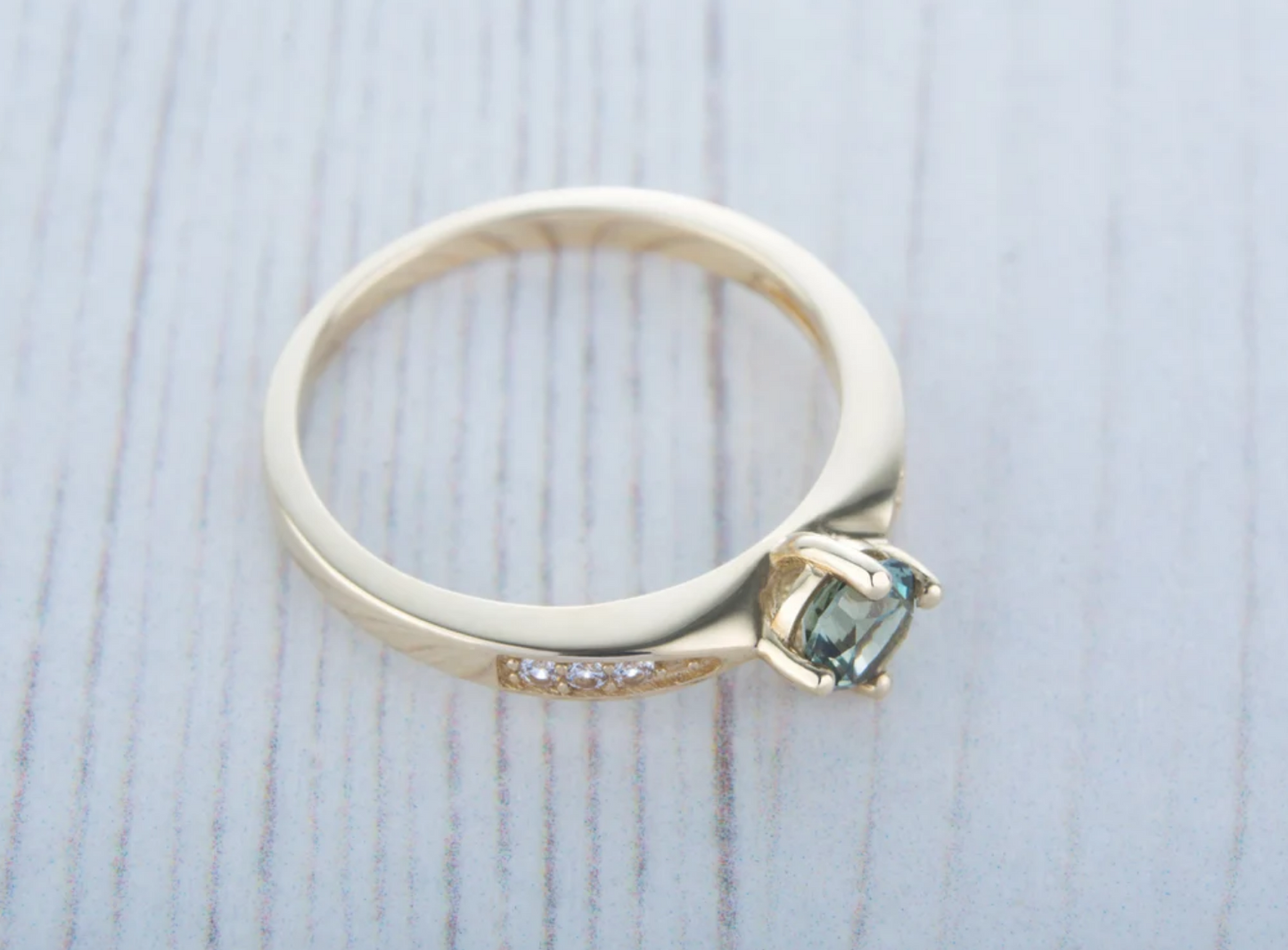 Size O / US 7 10K Solid Yellow Gold and Green Sapphire Engagement ring.