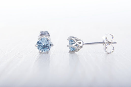 Natural Aquamarine stud earrings, available in titanium, white gold and surgical steel 4mm or 5mm sizes
