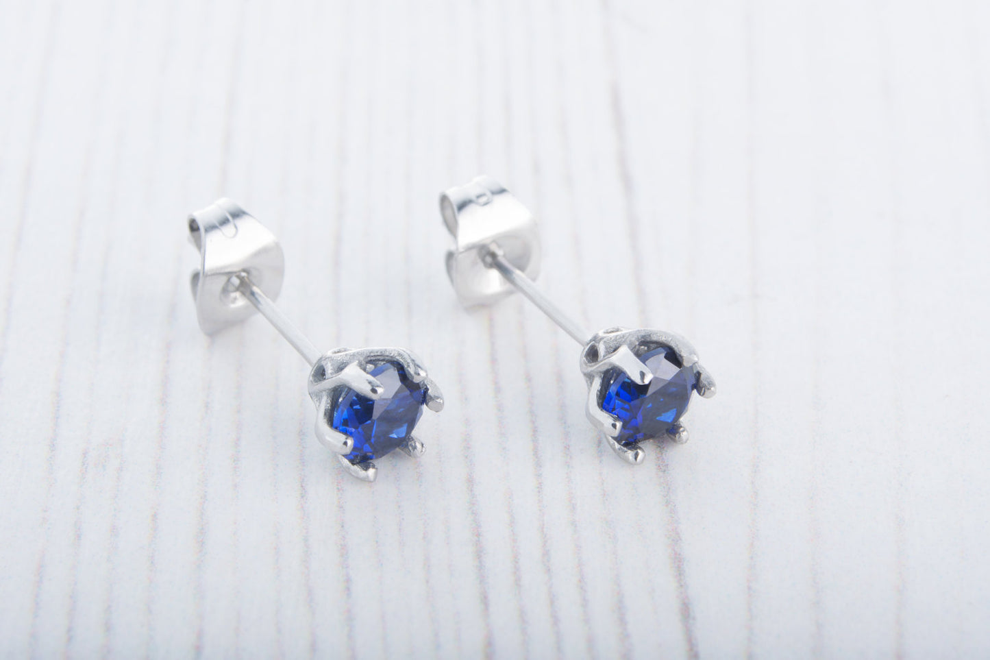 Lab Blue Sapphire stud earrings, available in titanium, white gold and surgical steel 4mm, 5mm, 6mm sizes