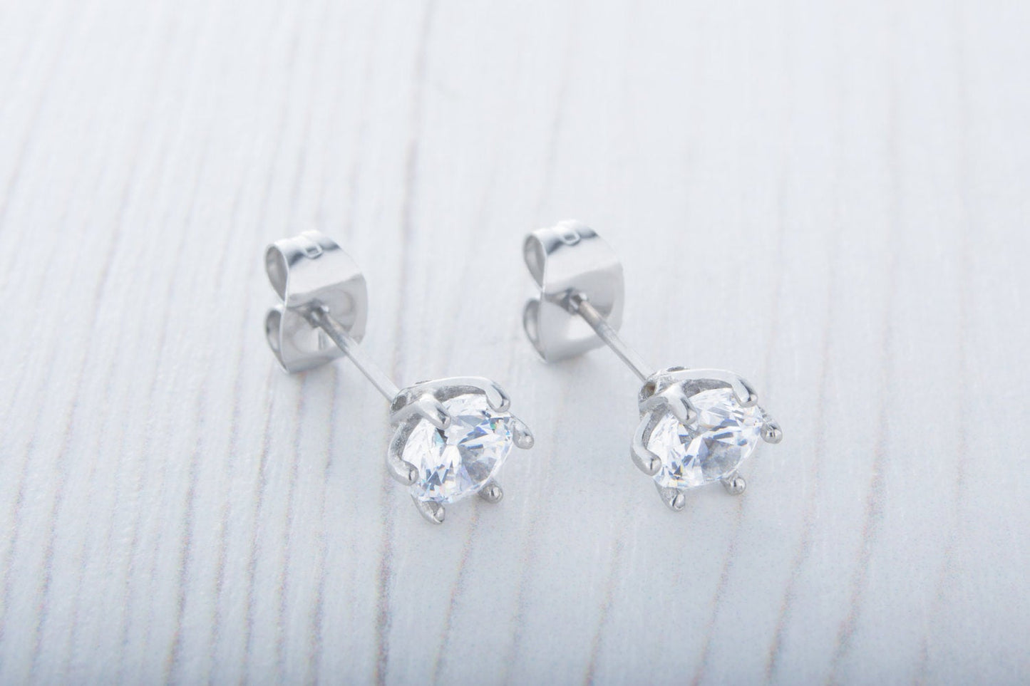 Man Made Diamond Simulant stud earrings, available in titanium, white gold and surgical steel 4mm, 5mm or 6mm sizes