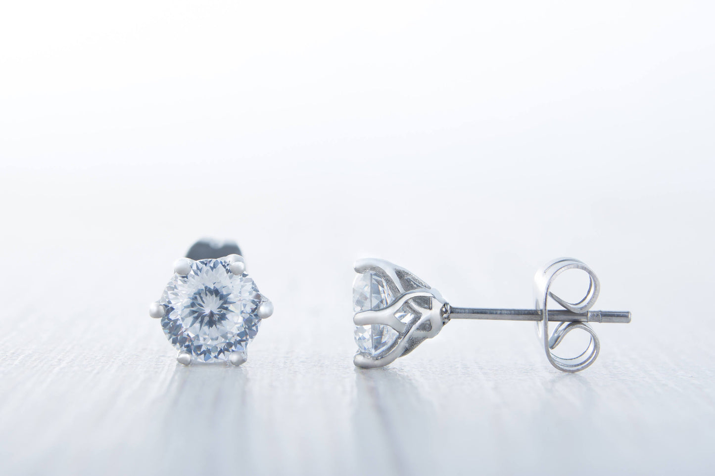 Portuguese Cut Man Made Diamond Simulant stud earrings, available in titanium, white gold and surgical steel 5mm or 6mm sizes