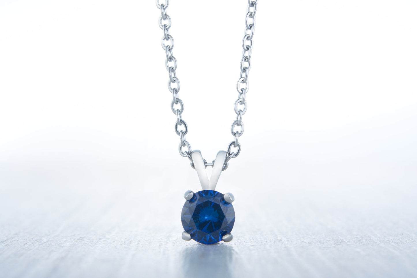Royal blue sapphire pendant necklace - Available in white gold or titanium