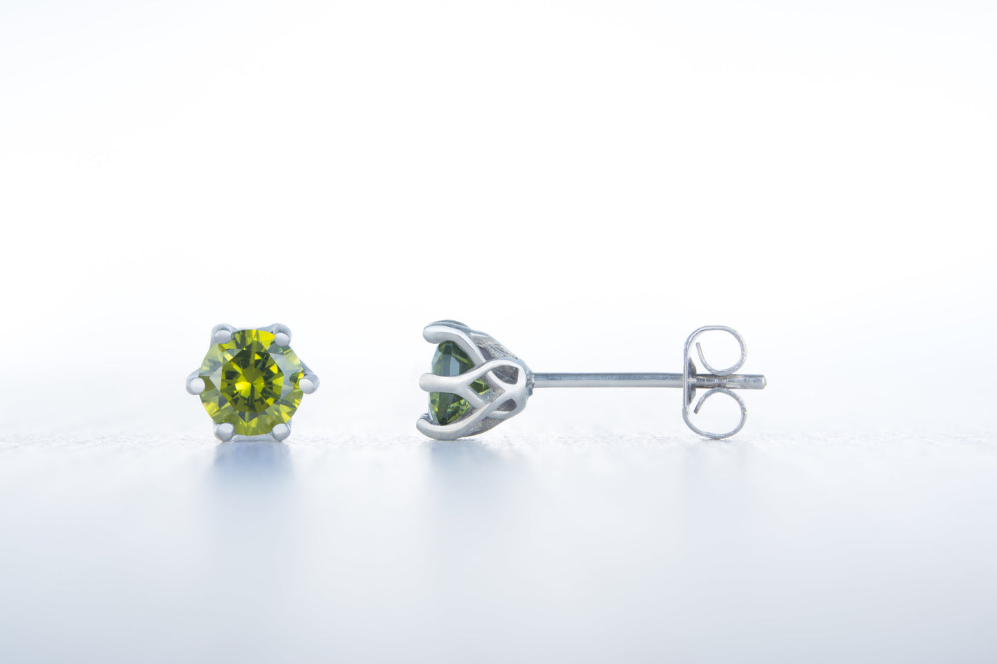 Natural Peridot stud earrings, available in titanium, white gold and surgical steel 4mm, 5mm and 6mm sizes