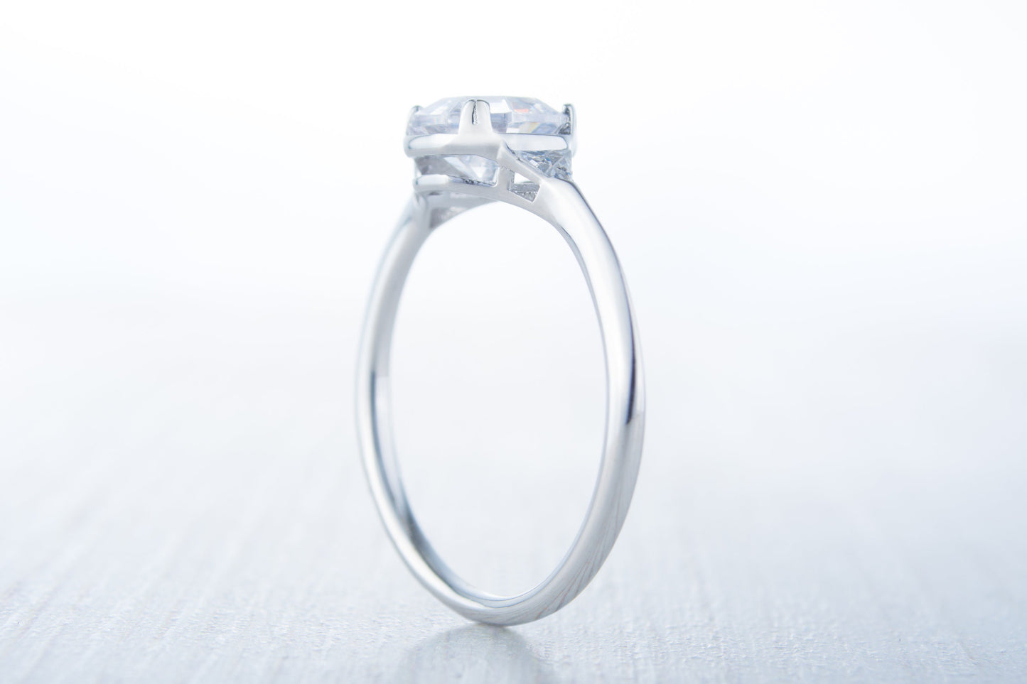 Man made diamond octagon & Trillion solitaire engagement ring available in Sterling Silver and White Gold Filled