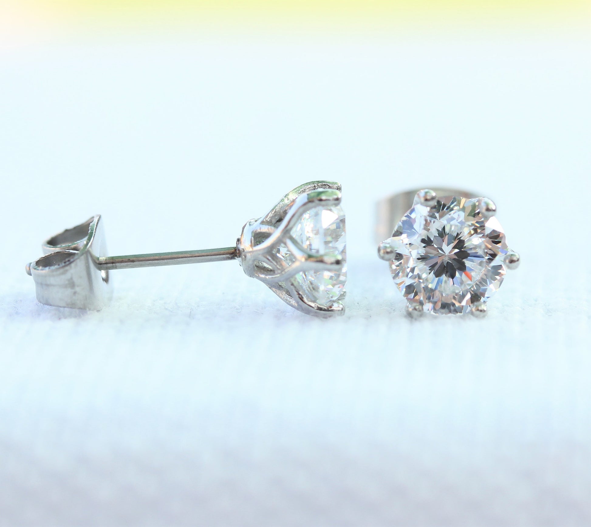 Flower and Hearts Cut Man Made Diamond Simulant stud earrings, available in titanium, white gold and surgical steel 4mm, 5mm or 6mm sizes