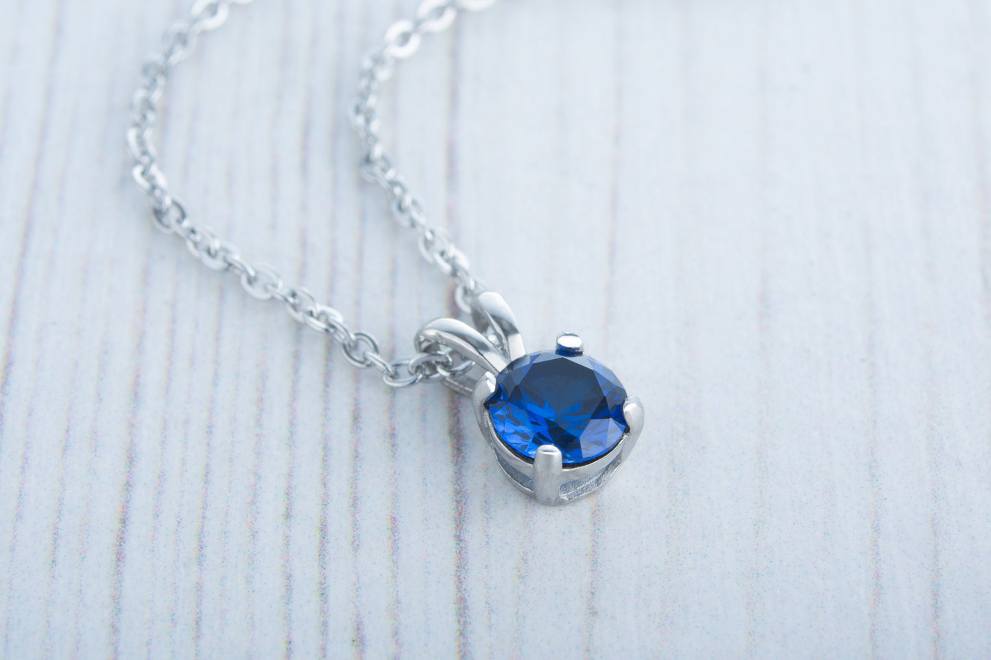 Royal blue sapphire pendant necklace - Available in white gold or titanium