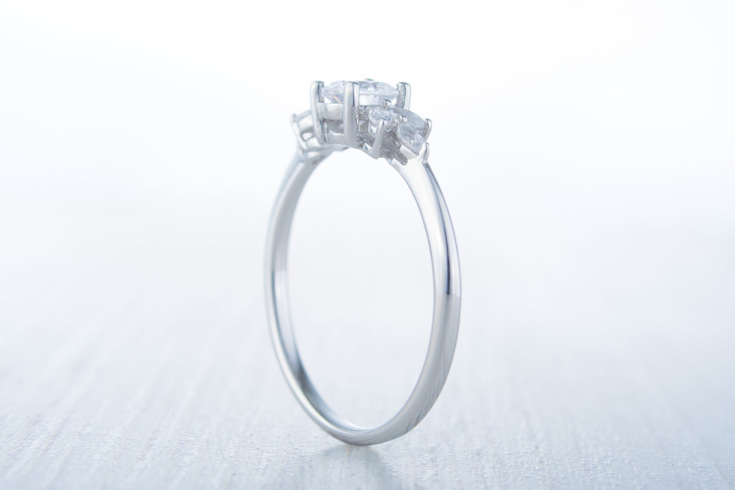 Man made diamond round & marquise solitaire engagement ring available in Sterling Silver or White Gold Filled
