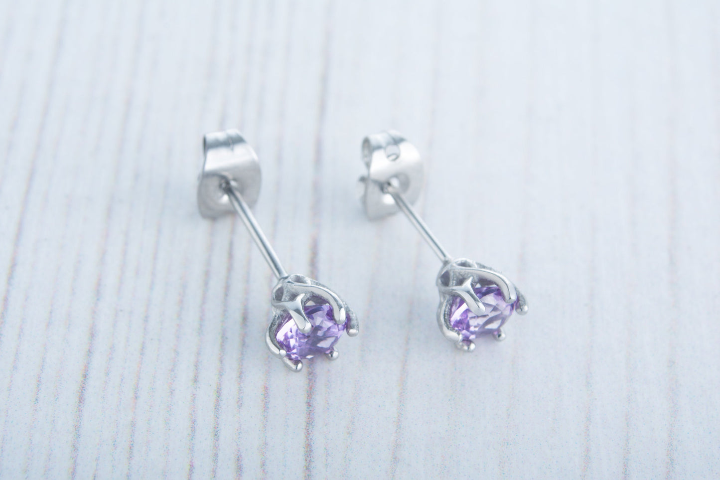 Lab Alexandrite stud earrings, available in titanium, white gold and surgical steel 4mm, 5mm or 6mm sizes