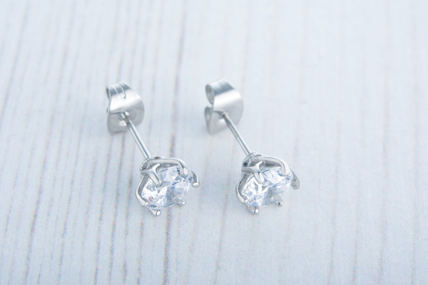 Flower and Hearts Cut Man Made Diamond Simulant stud earrings, available in titanium, white gold and surgical steel 4mm, 5mm or 6mm sizes