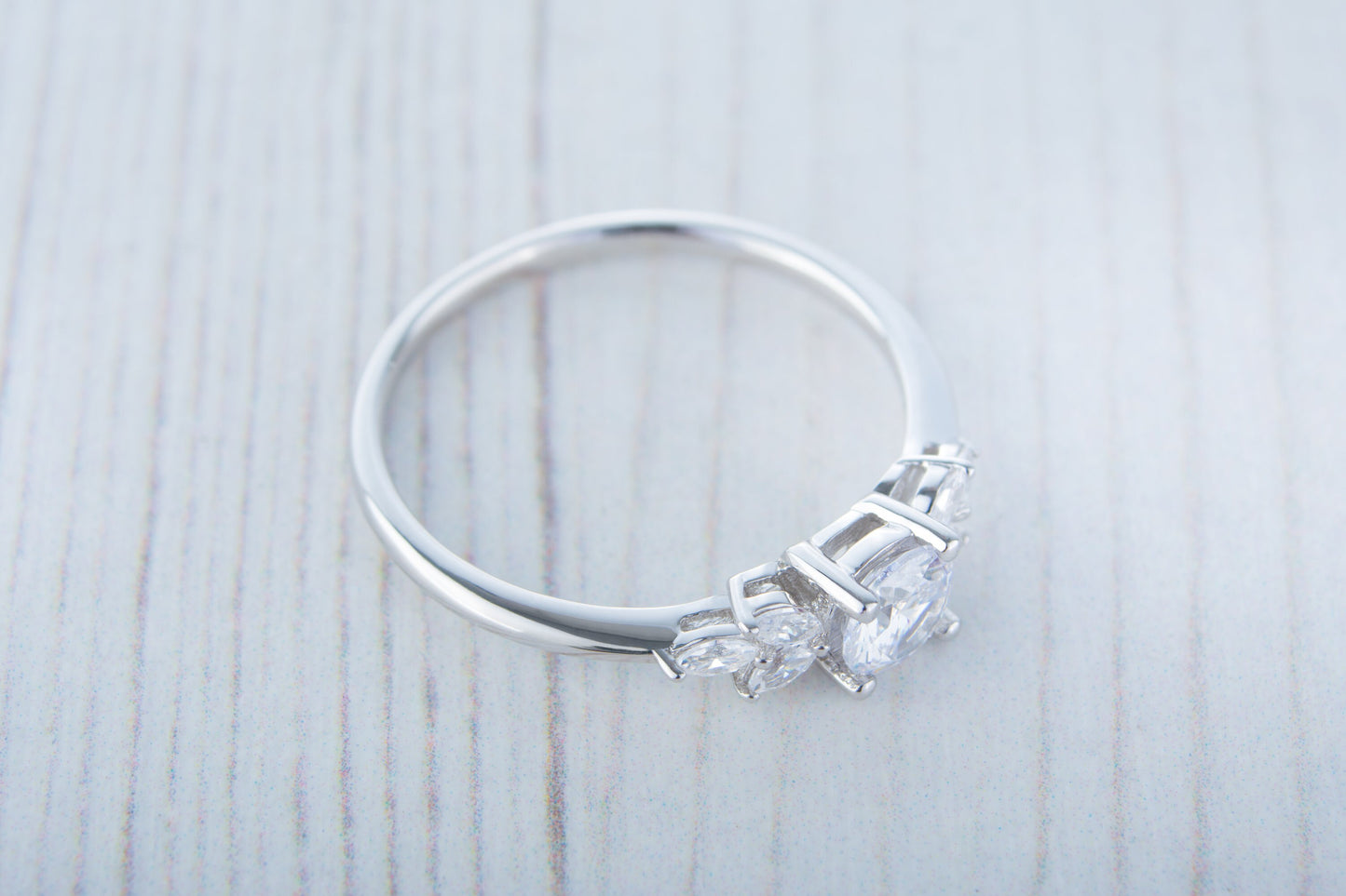 Man made diamond round & marquise solitaire engagement ring available in Sterling Silver or White Gold Filled