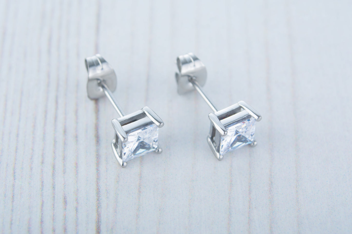 Man Made Diamond Simulant stud earrings, available in titanium, white gold and surgical steel 3mm, 4mm & 5mm sizes