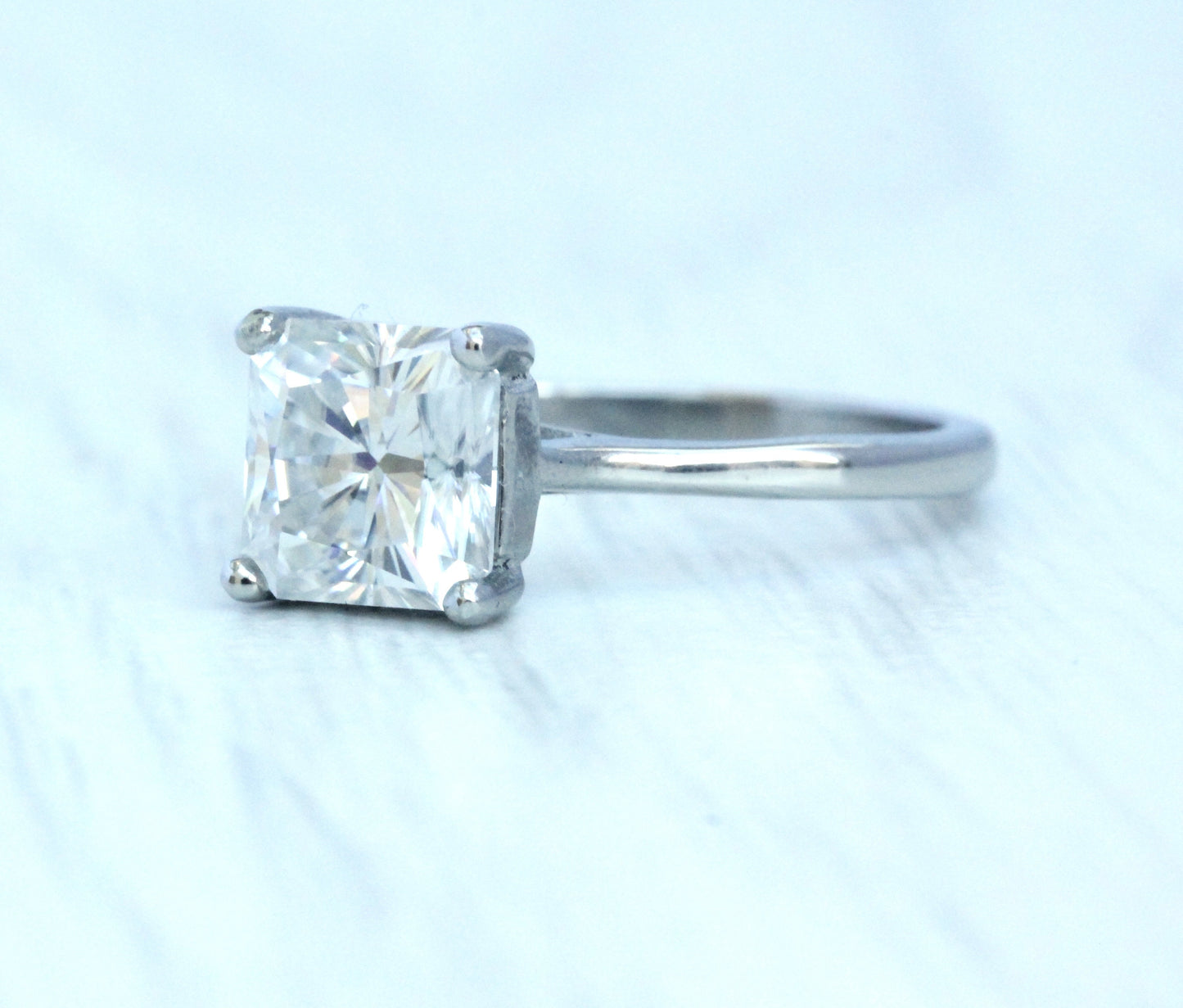 Square Radiant Cut Moissanite Solitaire cathedral ring in Titanium or White Gold