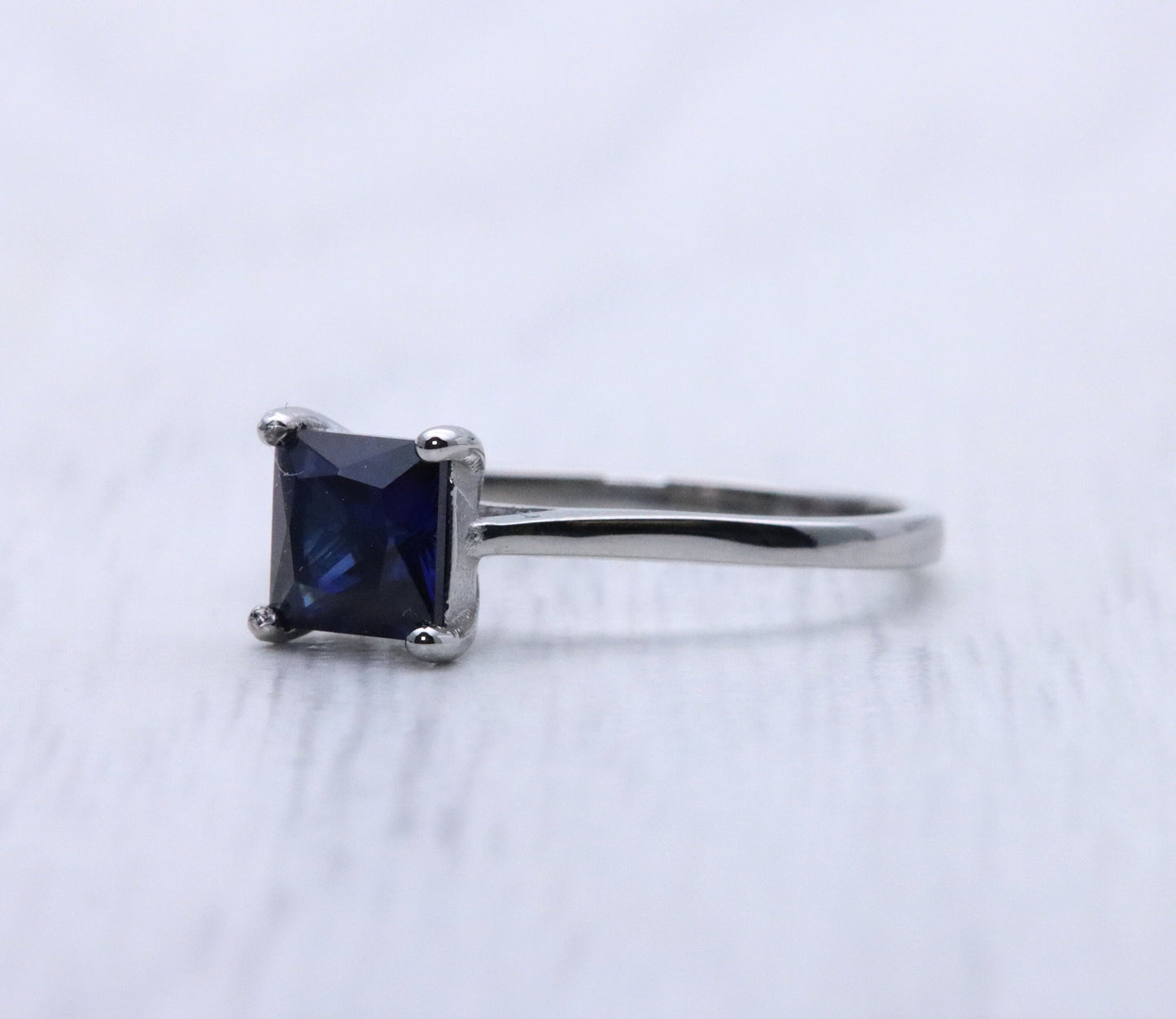 1ct Princess Cut lab blue sapphire Solitaire cathedral ring in Titanium or White Gold