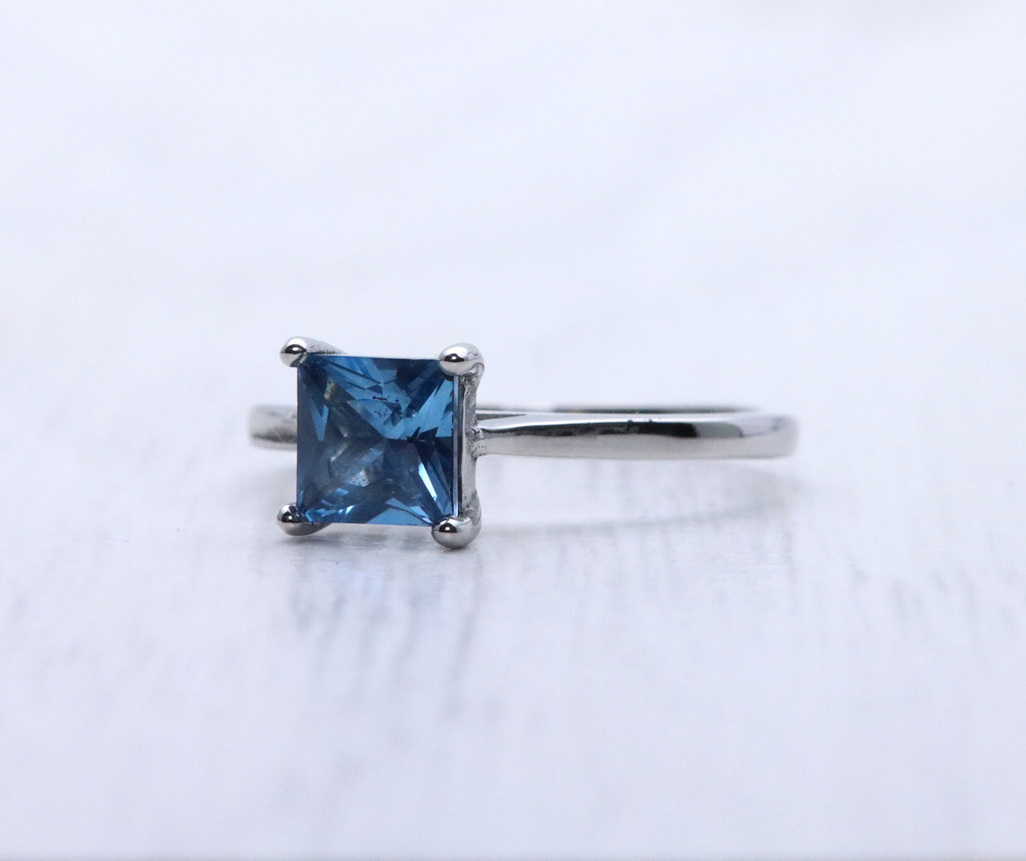 1ct Princess Cut natural blue topaz Solitaire cathedral ring in Titanium or White Gold
