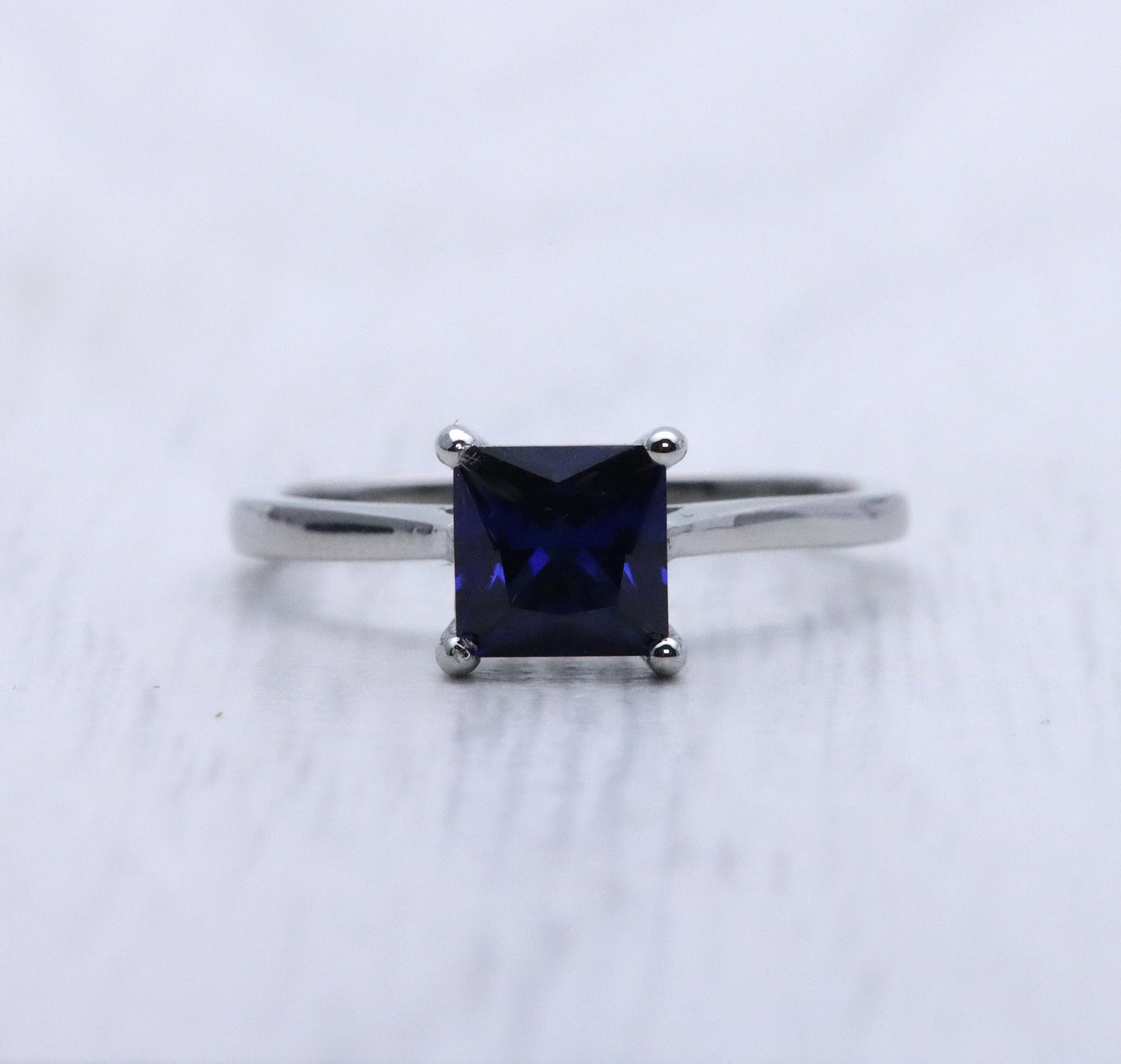 1ct Princess Cut lab blue sapphire Solitaire cathedral ring in Titanium or White Gold