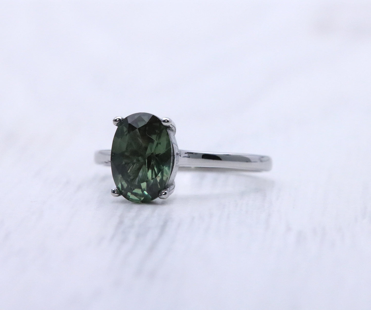 1.7ct Oval Cut Green Sapphire Solitaire cathedral ring in Titanium or White Gold