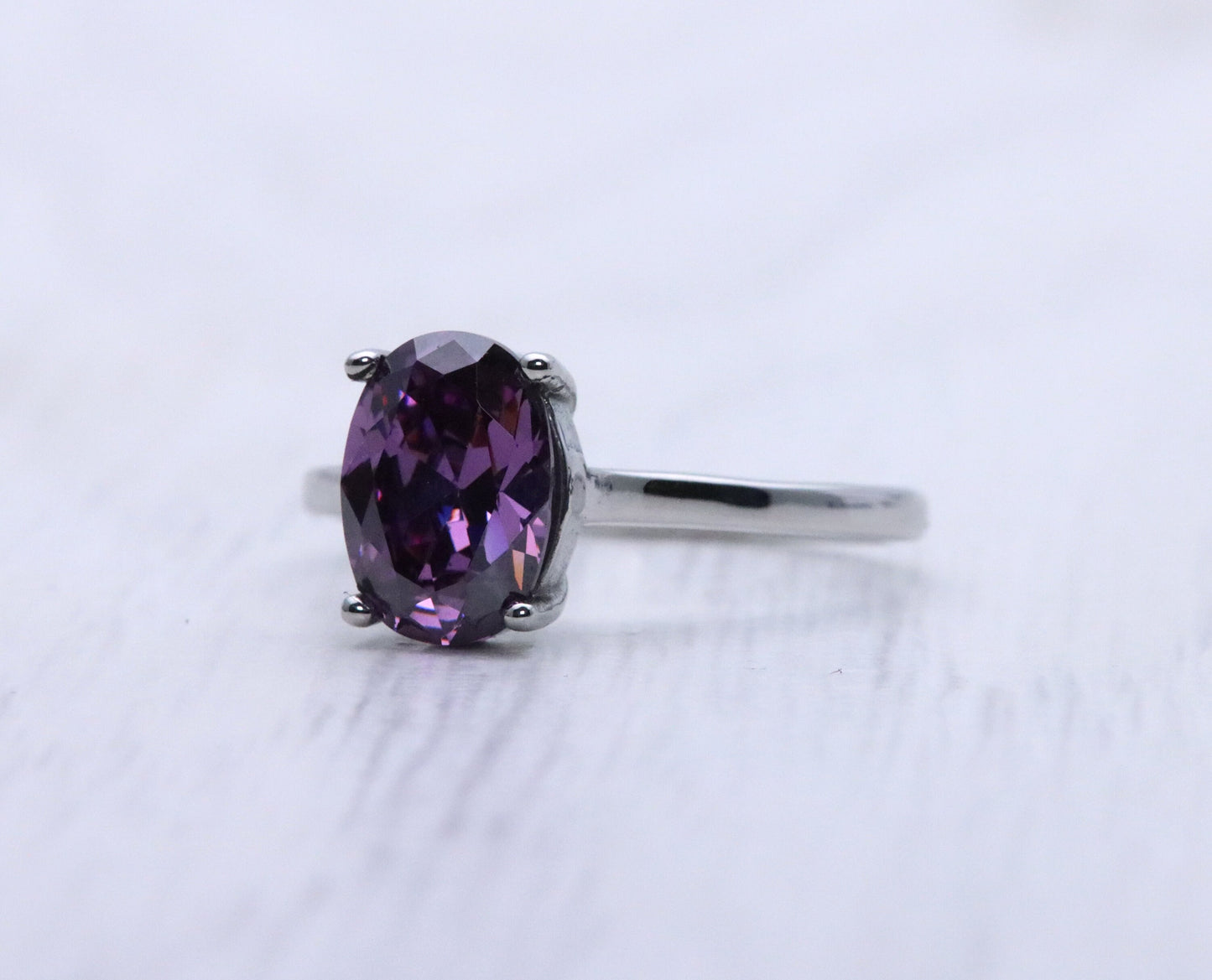 0.7 to 1.7ct oval Cut amethyst Solitaire cathedral in Titanium or White Gold