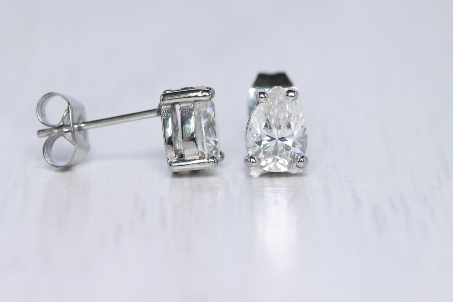 GENUINE Pear Cut Moissanite stud earrings, available in titanium, white gold and surgical steel