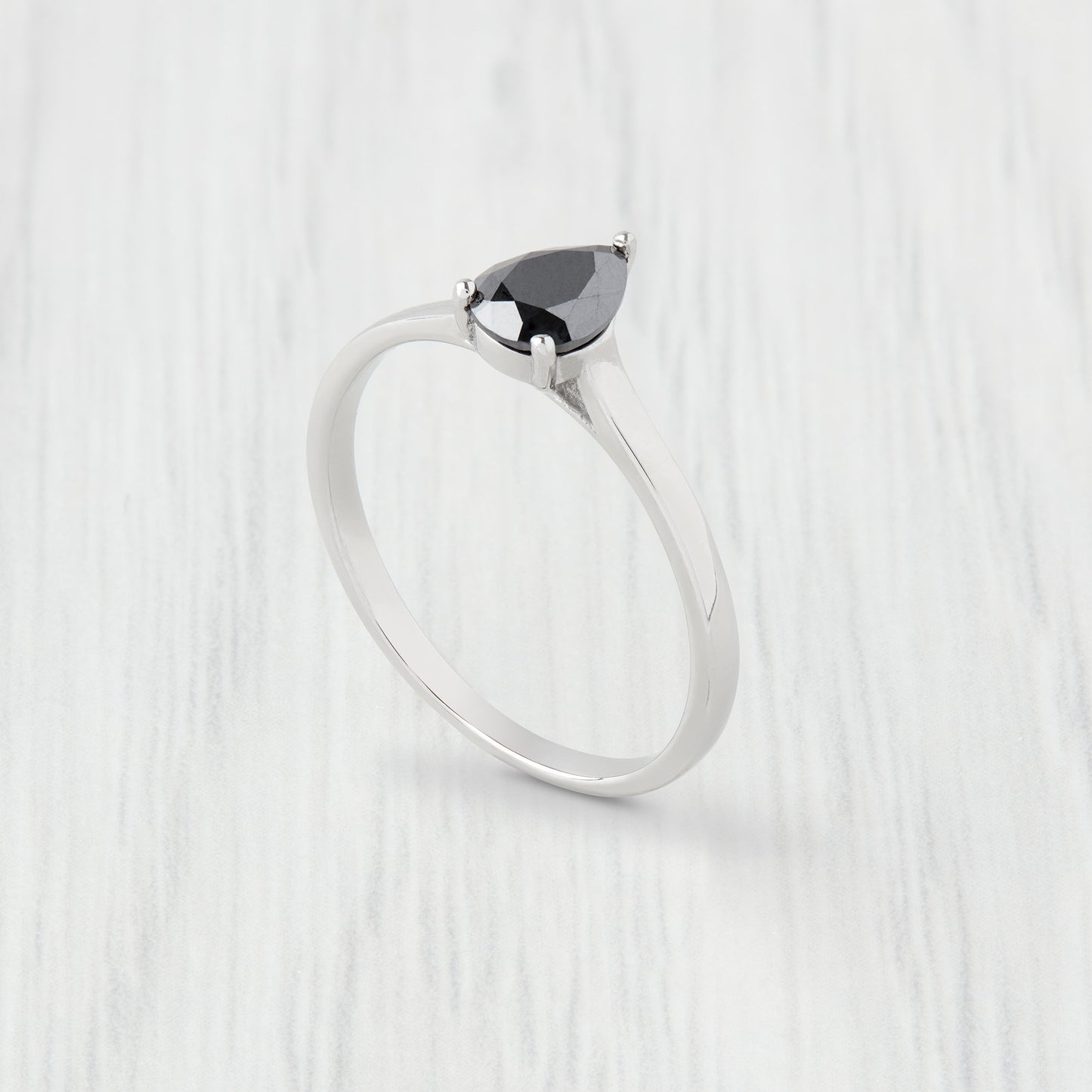 0.7ct Pear Cut Black Moissanite Solitaire cathedral in Titanium or White Gold