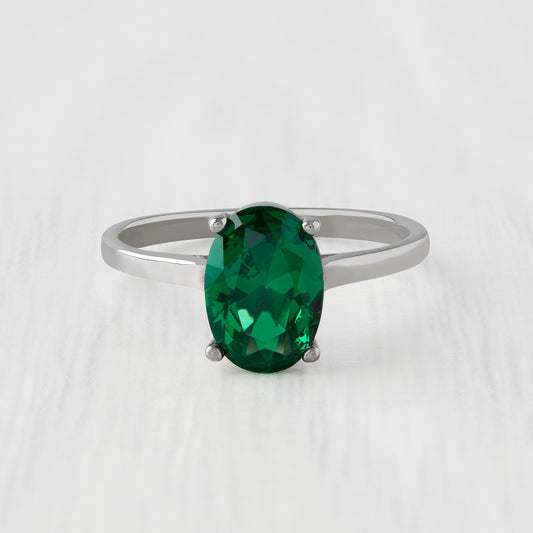 0.7 to 1.7ct Oval Cut lab Emerald Solitaire cathedral in Titanium or White Gold
