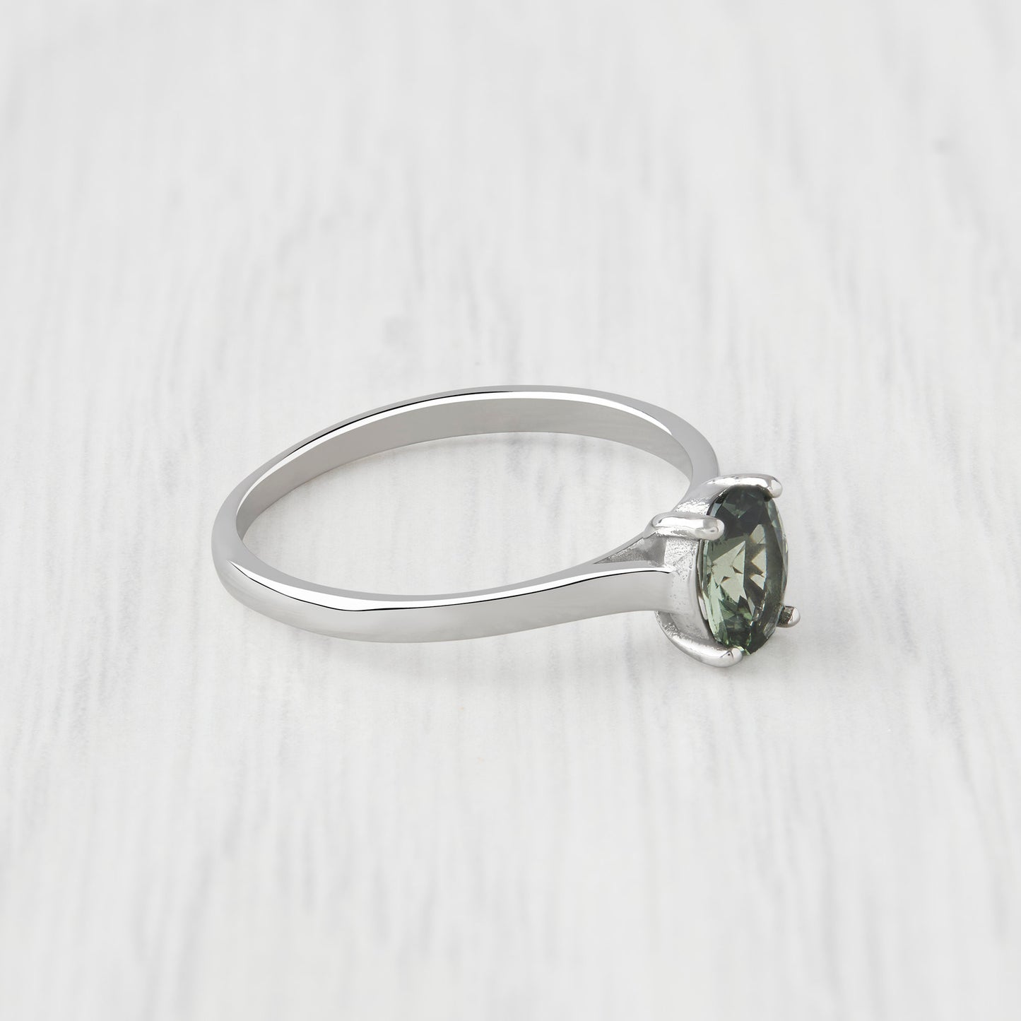 0.7ct Oval Cut Green Sapphire Solitaire cathedral ring in Titanium or White Gold