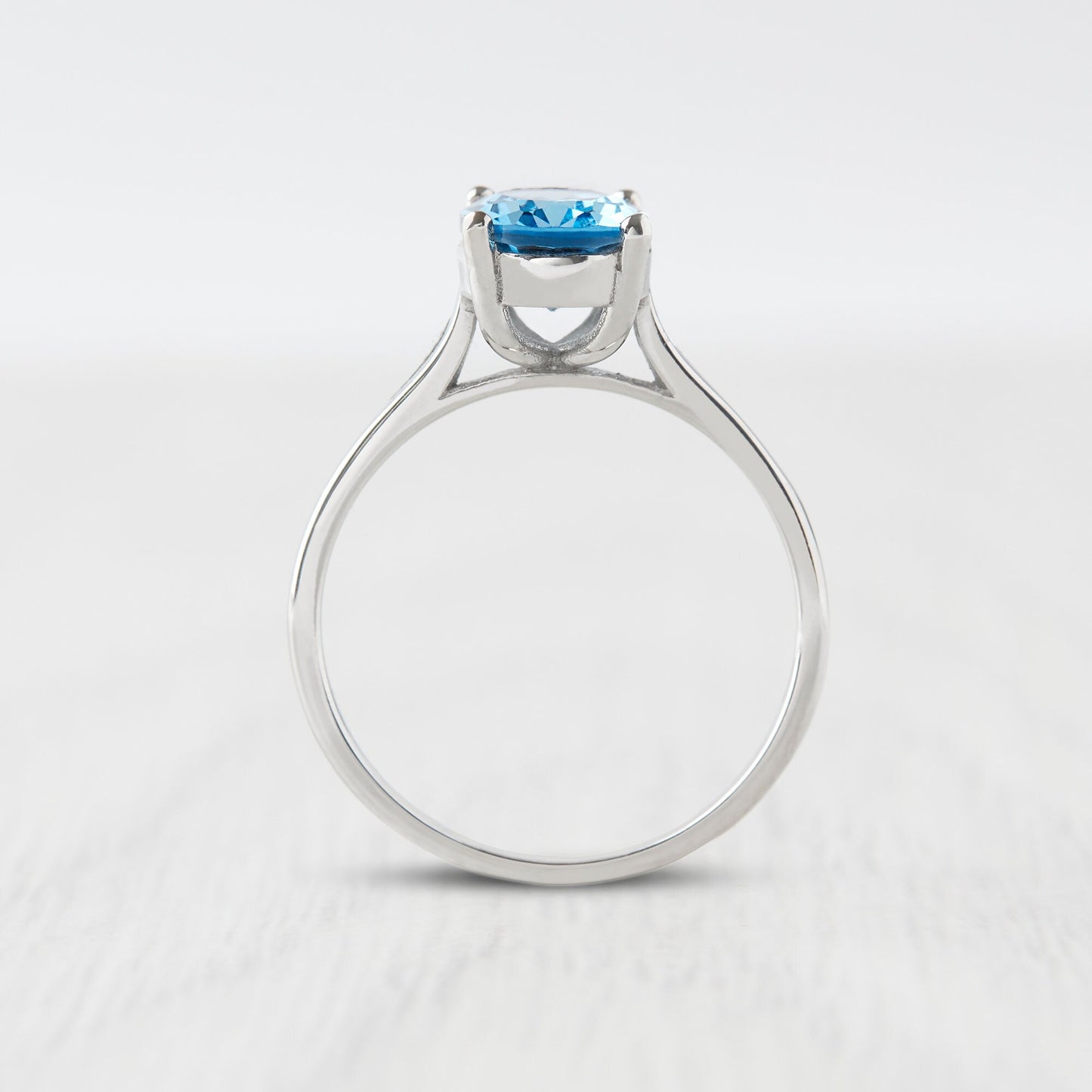 1.7ct Oval Cut natural blue topaz Solitaire cathedral ring in Titanium or White Gold