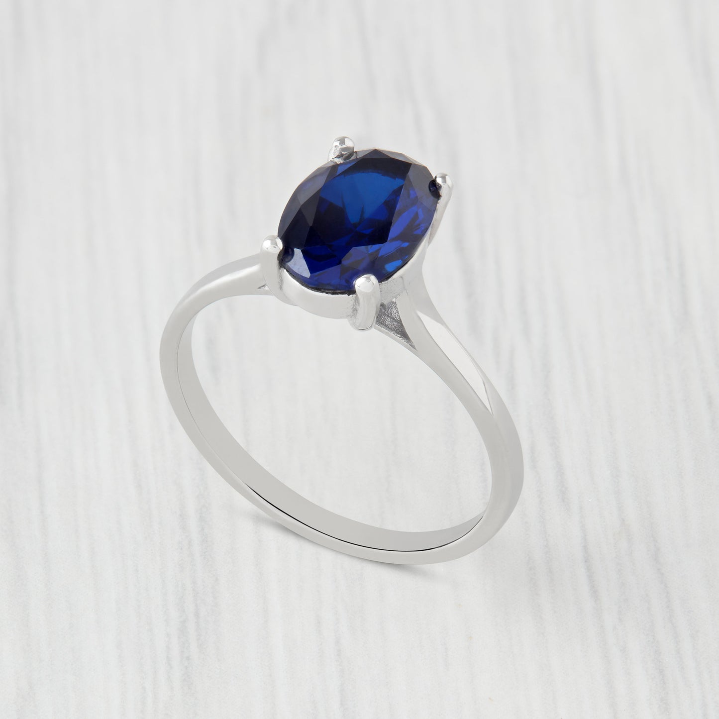 1.7ct Oval Cut Lab Blue Sapphire Solitaire cathedral ring in Titanium or White Gold